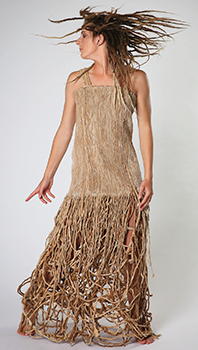 a young woman wearing a dress made from sustainable materials fully woven top and the bottom looks like ropes